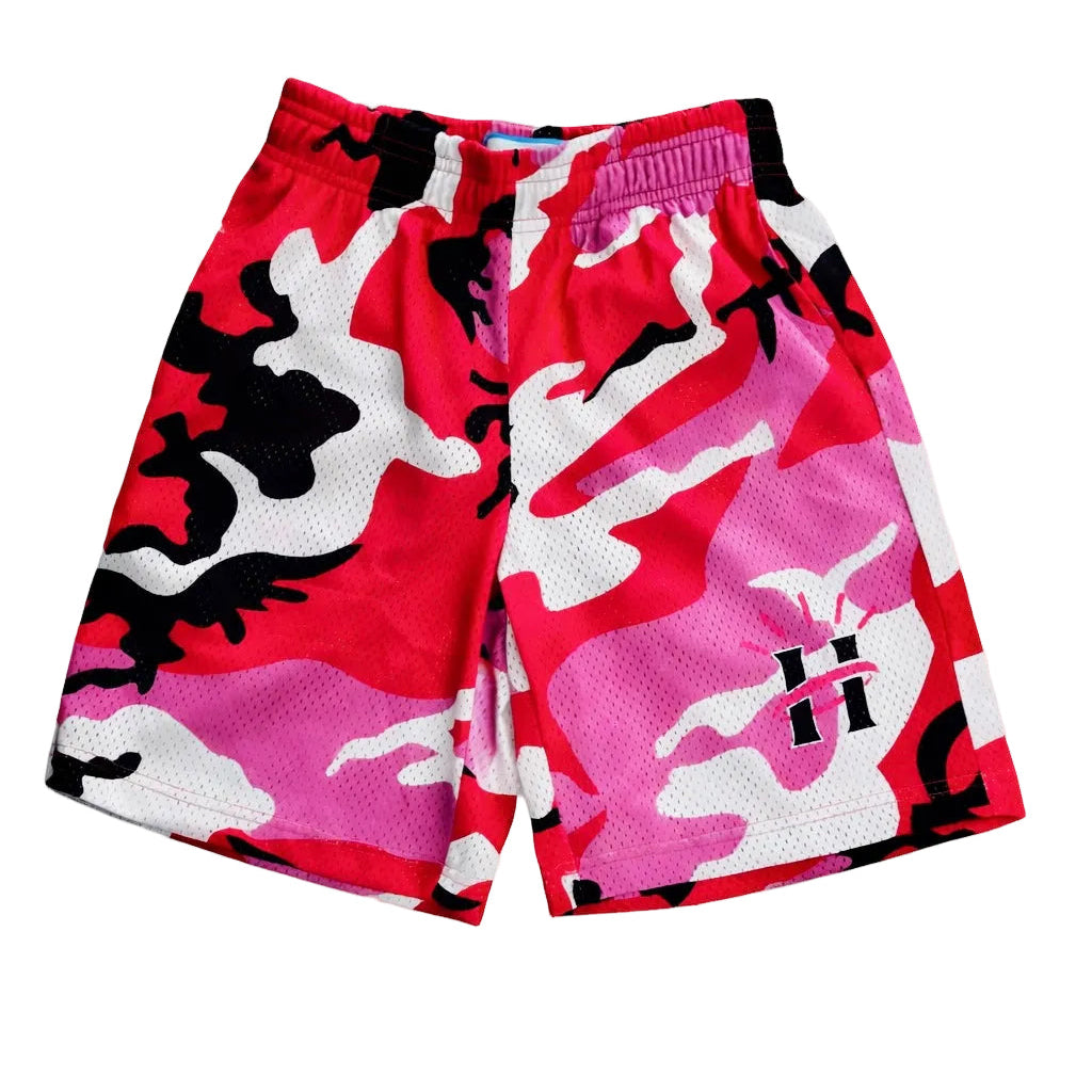 Front view of pink camo mesh shorts featuring HALOD logo and breathable unlined mesh fabric.
